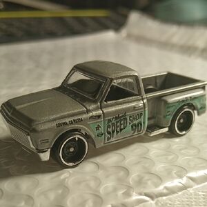 Speed Shop Die-Cast Hot Wheels Truck in Silver and Green
